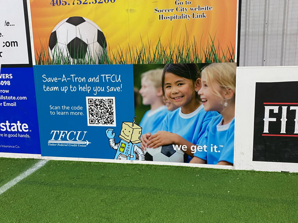 Tinker Federal Credit Union sponsorship ad at Soccer City in Tulsa. 4x8 wall wrap.