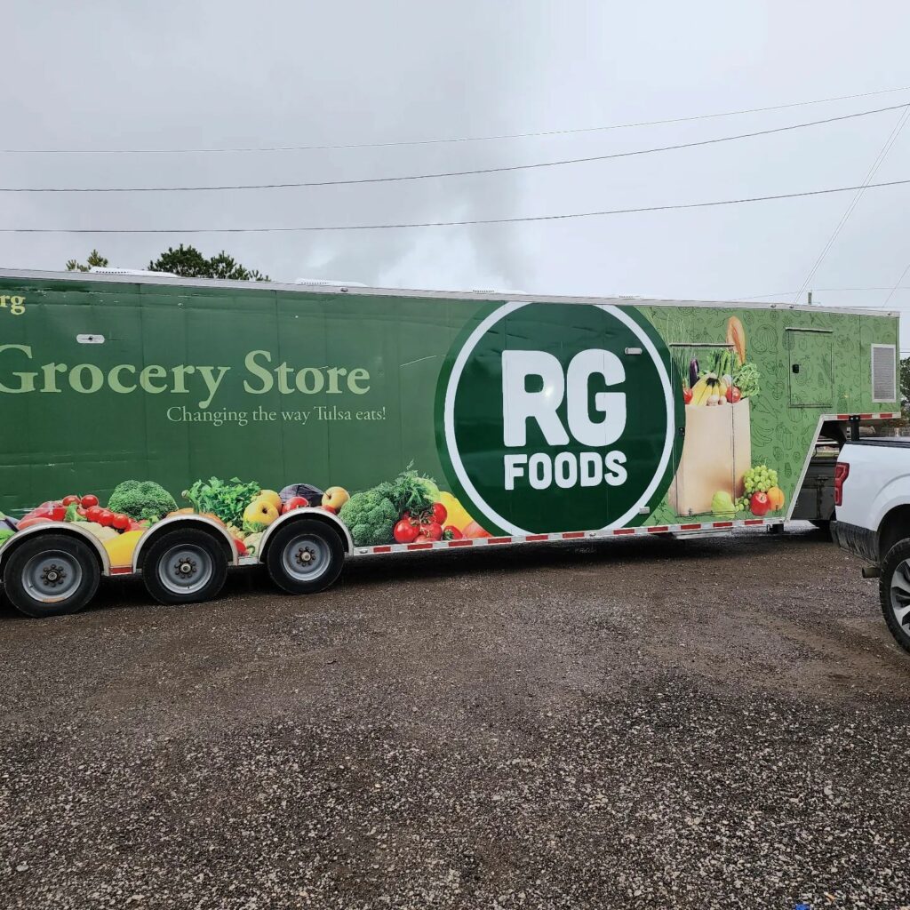 mobile grocery store wrap. RG Foods Mobile Grocery Store Logo Overlay. logo wrap.