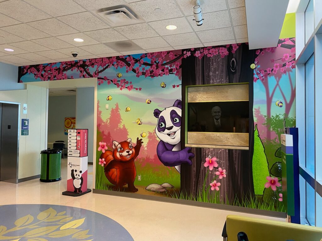 St. Francis NICU Wall Wraps. Interior Wall Mural with matte laminate for low glare. Graphics by artist Scribe. Children's Hospital -panda and squirrel