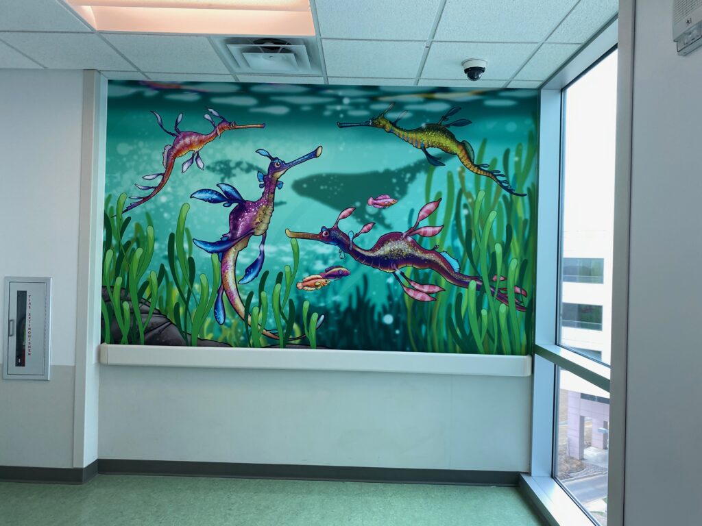 St. Francis NICU wall mural - matte laminate for low glare. Graphics by Scribe.